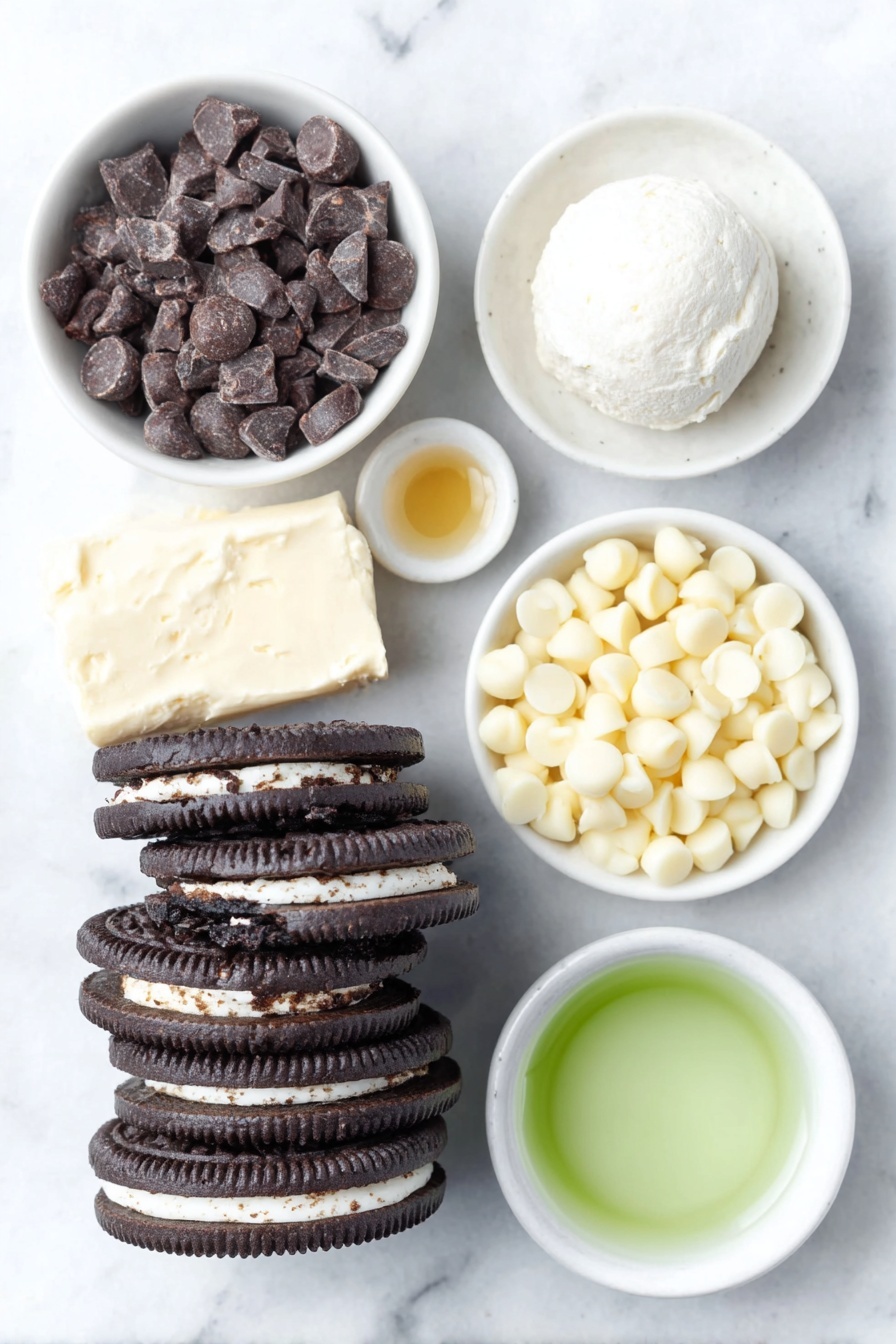 Flat lay of a stack of fresh mint Oreo cookies with their dark chocolate and white cream layers visible, a small ball of soft cream cheese on a simple white ceramic plate, a small white bowl filled with glossy semi-sweet chocolate chips, another small white bowl holding smooth, solid coconut oil chunks, a tiny white bowl with pale green liquid representing mint extract, a separate small white bowl of white chocolate chips, and a small white bowl containing vibrant green liquid with a few drops of green food coloring mixed in, all perfectly arranged with balanced spacing and symmetry placed on a clean white marble surface, soft natural light, photo taken with an iPhone, professional food photography style, fresh ingredients, white ceramic bowls, no bottles, no duplicates, no utensils, no packaging --ar 2:3 --v 7 --p m7354615311229779997
