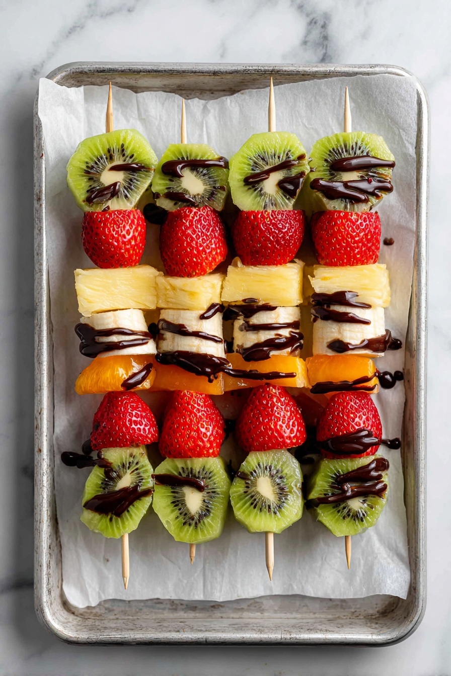 A white plate holds five wooden skewers arranged in a circular pattern. Each skewer has a mix of bright red strawberries, green kiwi slices, and yellow pineapple chunks stacked in layers. All the fruit pieces are drizzled with dark chocolate sauce, giving a striped look over the colorful fruit. The plate sits on a white marbled surface, creating a clean and fresh background. The photo taken with an iphone --ar 2:3 --v 7